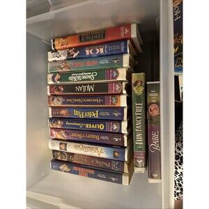 14 total Disney VHS movies, w/Beauty and the Beast. Plus 10 Extra